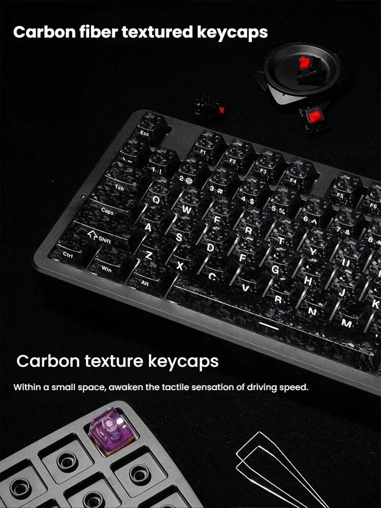 Close-up of carbon fiber textured keycaps on a mechanical keyboard and a separate set of keycaps.