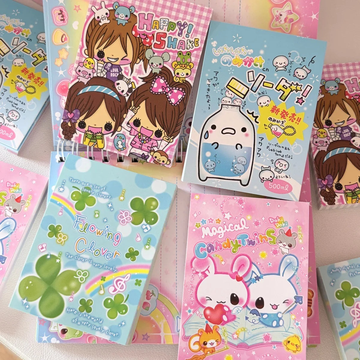 A collection of colorful decorative memo pads featuring cute characters and designs.