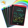 A stack of black and colored LCD writing tablets with neon green drawings on the screen.