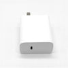 A white secret storage charger plug for valuables with a small metal tip.
