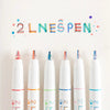 A collection of six dual-color line marker pens arranged in a row against a white background.
