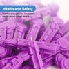 A close-up of purple sterile blood lancet devices for testing, sterilized by gamma irradiation.