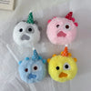 Four plush toys with conical hats in white, pink, blue, and yellow colors