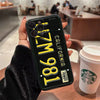 A black phone case shaped like a vintage California license plate with the text 1861 and the year 1964