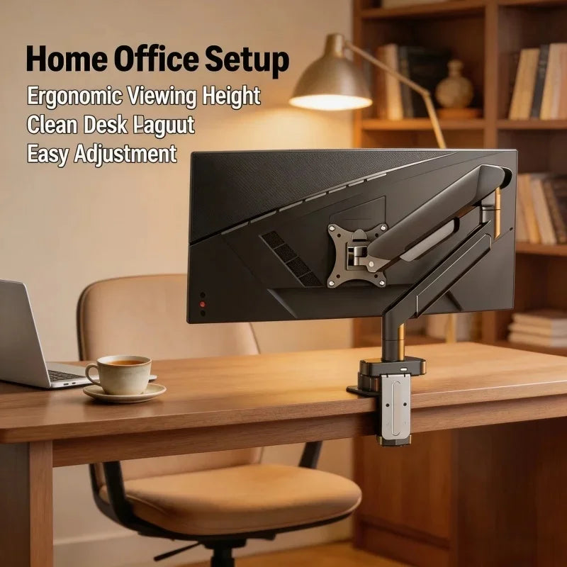 A black monitor is mounted on an ergonomic desk arm, positioned above a wooden desk in a home office setting.
