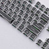 A close-up view of a set of translucent PBT keycaps with side printing in a cherry profile layout.