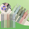 A collection of smooth fine tip gel pens in various pastel and muted colors arranged diagonally on a green background.