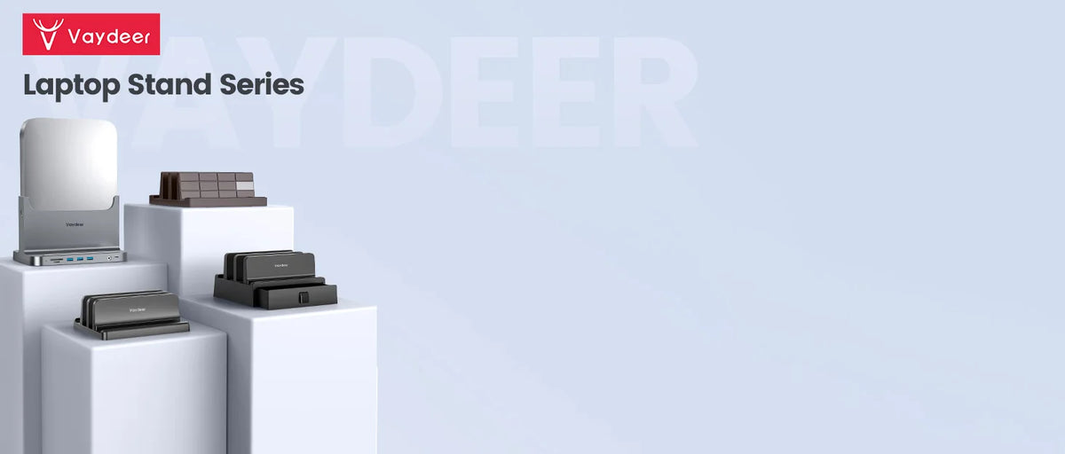 A white laptop stand series featuring a vertical laptop stand organizer with multiple slots.