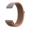 A close-up view of a gray and orange nylon loop watch strap for a child's watch.