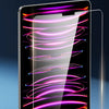 A close-up of a black iPad displaying a vibrant purple and pink tempered glass screen protector being applied.
