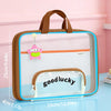 A transparent mesh file bag with a brown frame and a clear lid showing the word goodluck