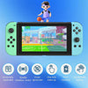 A green and blue portable gaming device with a small figure standing in front of it, showing various features.