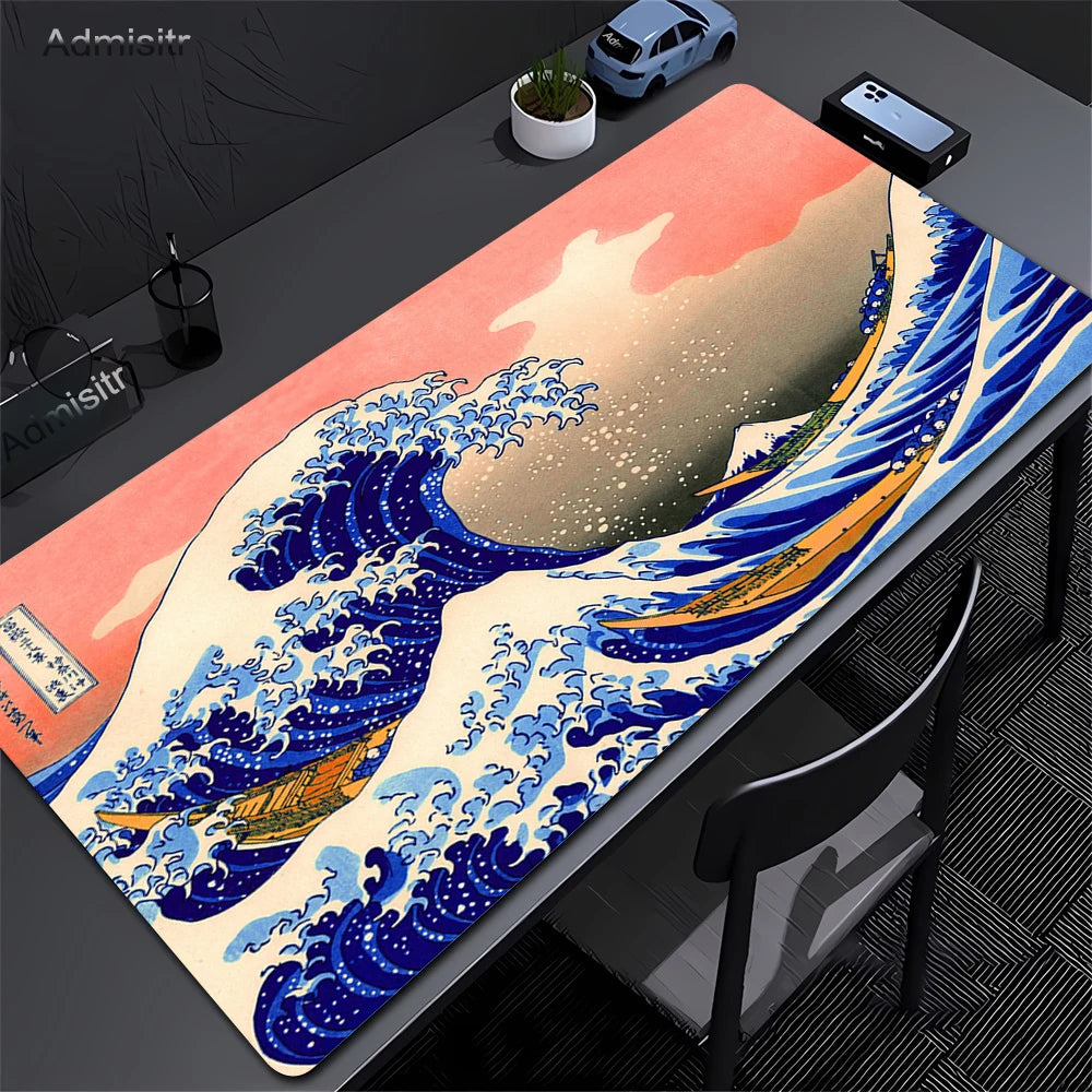 Extra-large mouse pad featuring a detailed illustration of The Great Wave of Kanagawa in blue and white on a pink background