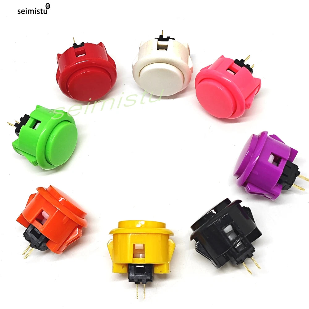 A collection of various colored arcade push buttons and micro switches for electronic projects.