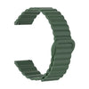 A close-up view of a dark green adjustable magnetic loop watch band.