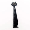 A black wooden drawing ruler shaped like a cat