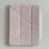 A pink leopard print leather case designed for an iPad, featuring a textured, segmented design.