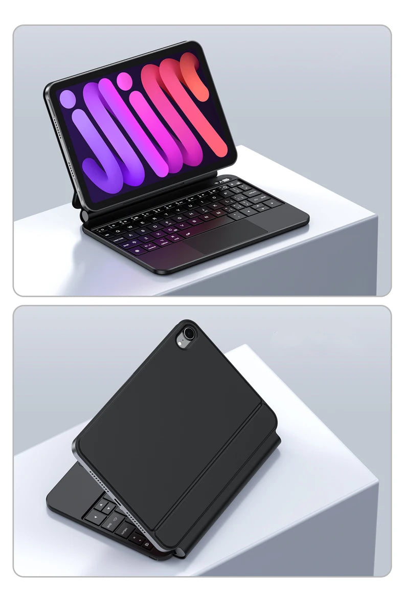 Estuche de teclado mágico negro retroiluminado para iPad Mini mostrado sobre una superficie blanca.