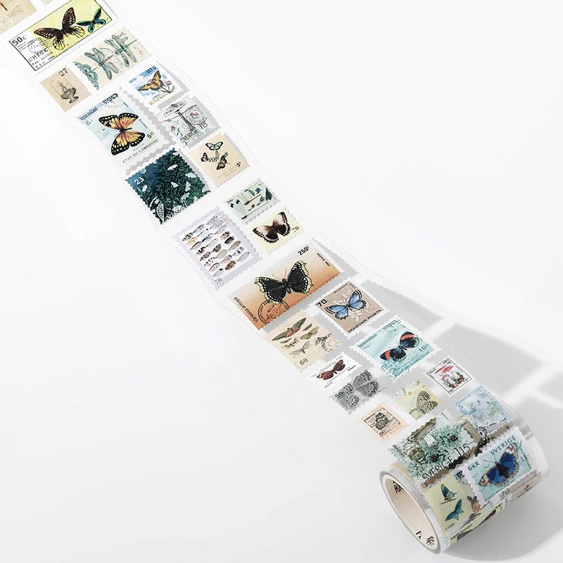 A roll of vintage stamp tape stickers for scrapbooking featuring various butterfly and nature themed designs.