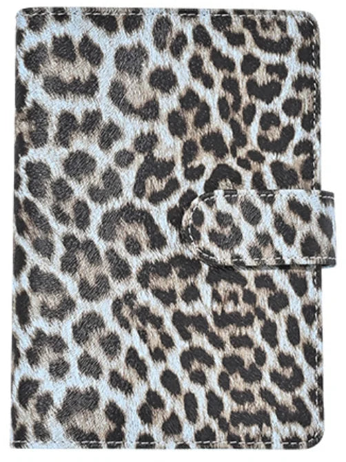 A leopard print A6 binder with a 6-hole loose leaf system.