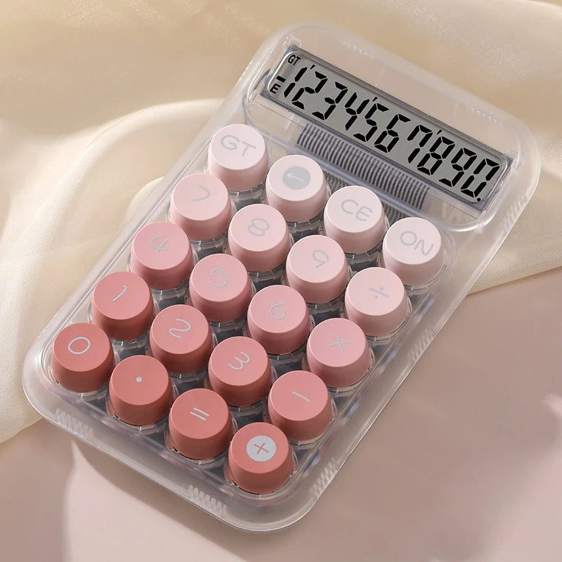 A clear plastic calculator with pink buttons and a digital display showing the number 1234567890.