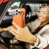 An orange phone case is shown being held in a hand inside a car, with text indicating perfect grip support.