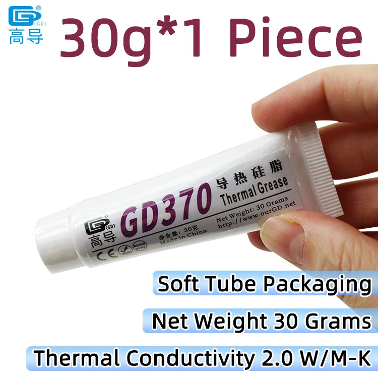 Tube of GD370 thermal grease paste with a hand holding it, showing its packaging and net weight.