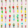 A collection of 16 colorful kawaii ballpoint pens in various shapes and designs.