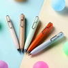 A collection of five Uni-Ball One Mini Cute Gel Pens in various colors, including pink, beige, mint green, orange, and white,