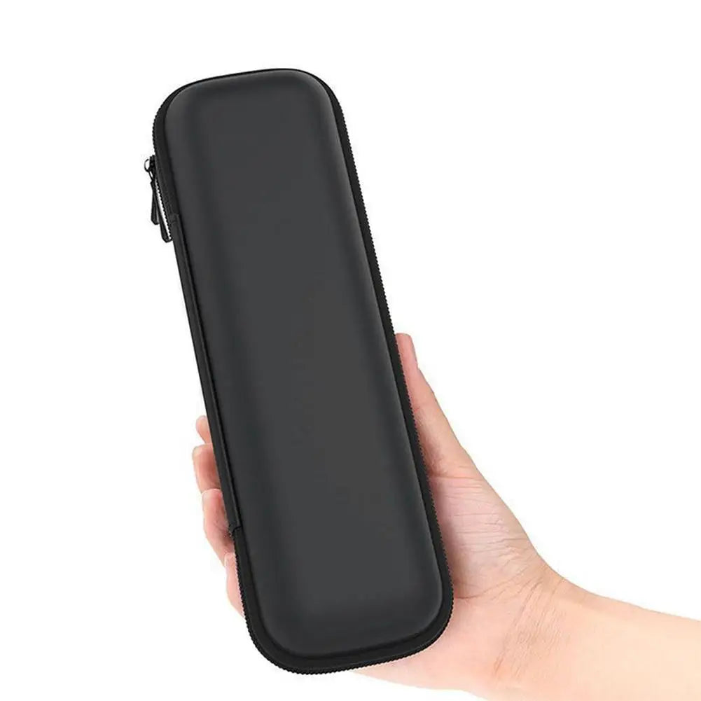 A hand is holding a black compact EVA hard shell pencil case with mesh pockets.