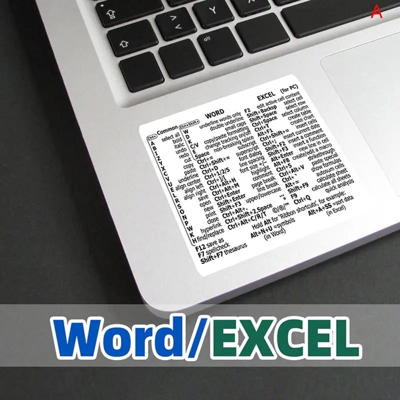 A close-up view of a laptop keyboard showing various Windows and Excel shortcuts.