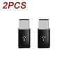 Two black and silver USB Type-C to Micro USB adapter converters