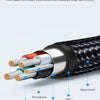 A cross-section of a thick tinned pure copper core cable showing nylon braid, PVC, and aluminum foil shielding.