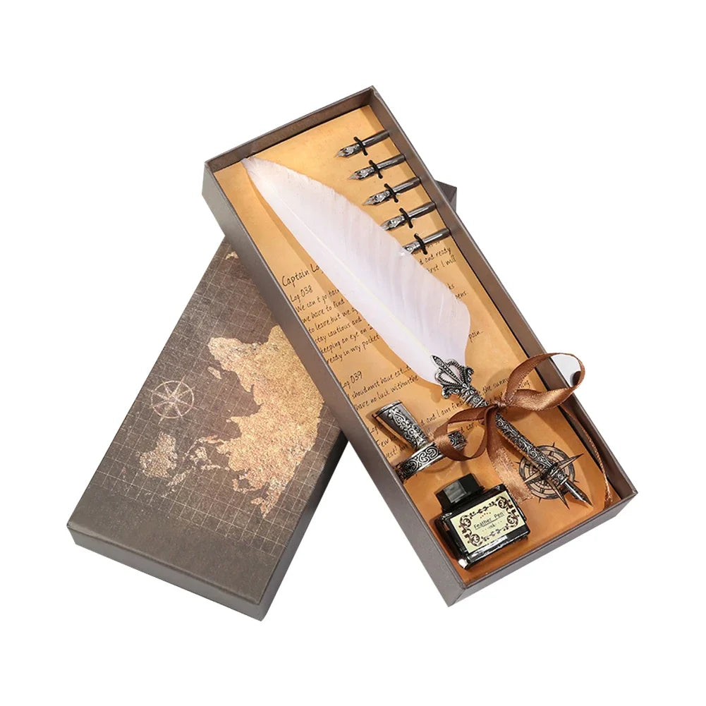 A wooden box containing a retro calligraphy feather dip pen set with various tools and a map.