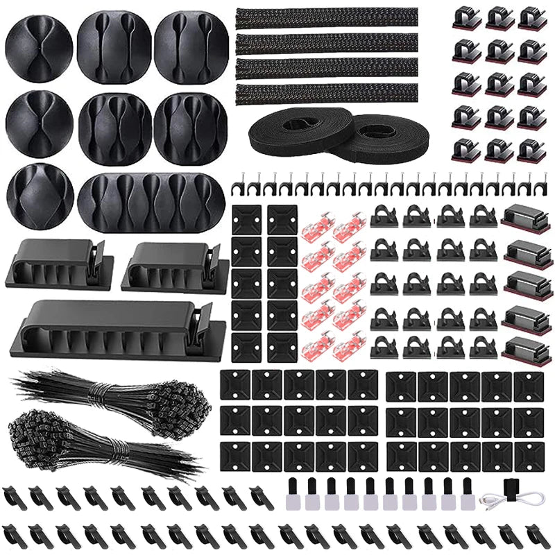 A collection of black cable organizers, including various clips and holders for managing desk cables.