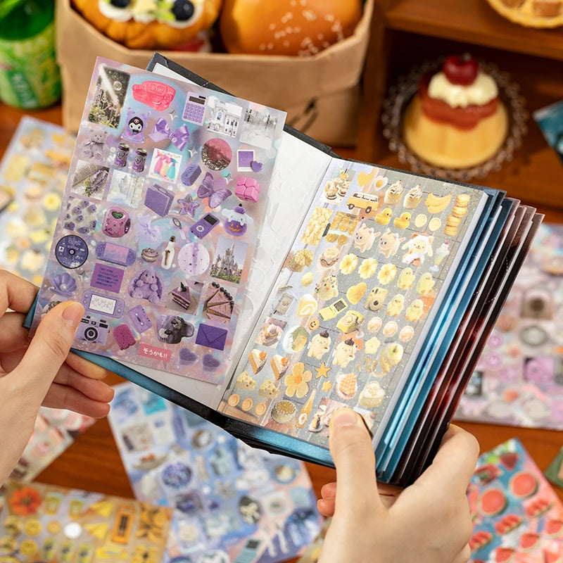 A hand holds open a sheet of Y2K aesthetic cut film stickers showing various colorful and patterned designs.