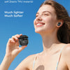 A woman is holding a black AI Translation Bluetooth earbud in her hand, demonstrating its lightweight and soft design.