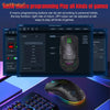 A black gaming mouse with green and purple RGB lighting is shown next to a keyboard on a blue surface.