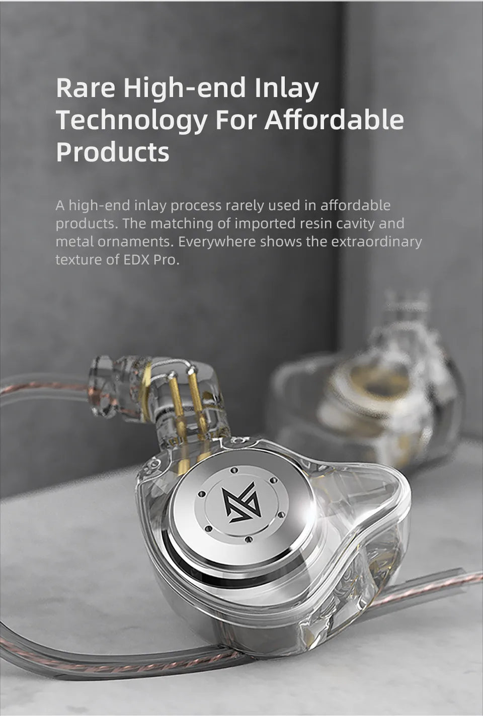 A close-up of KZ EDX PRO dynamic earphones with a clear housing and metallic accents.