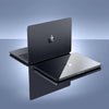 A silver ultra-slim hard shell case for a MacBook Pro is shown in various angles on a dark surface.