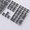 A close-up view of a full set of translucent PBT keycaps with side printing in a cherry profile layout