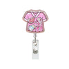 A pink anime large intestine badge reel featuring a cute character design.