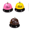 Three metal service bells in pink, yellow, and brown colors for desk or counter use