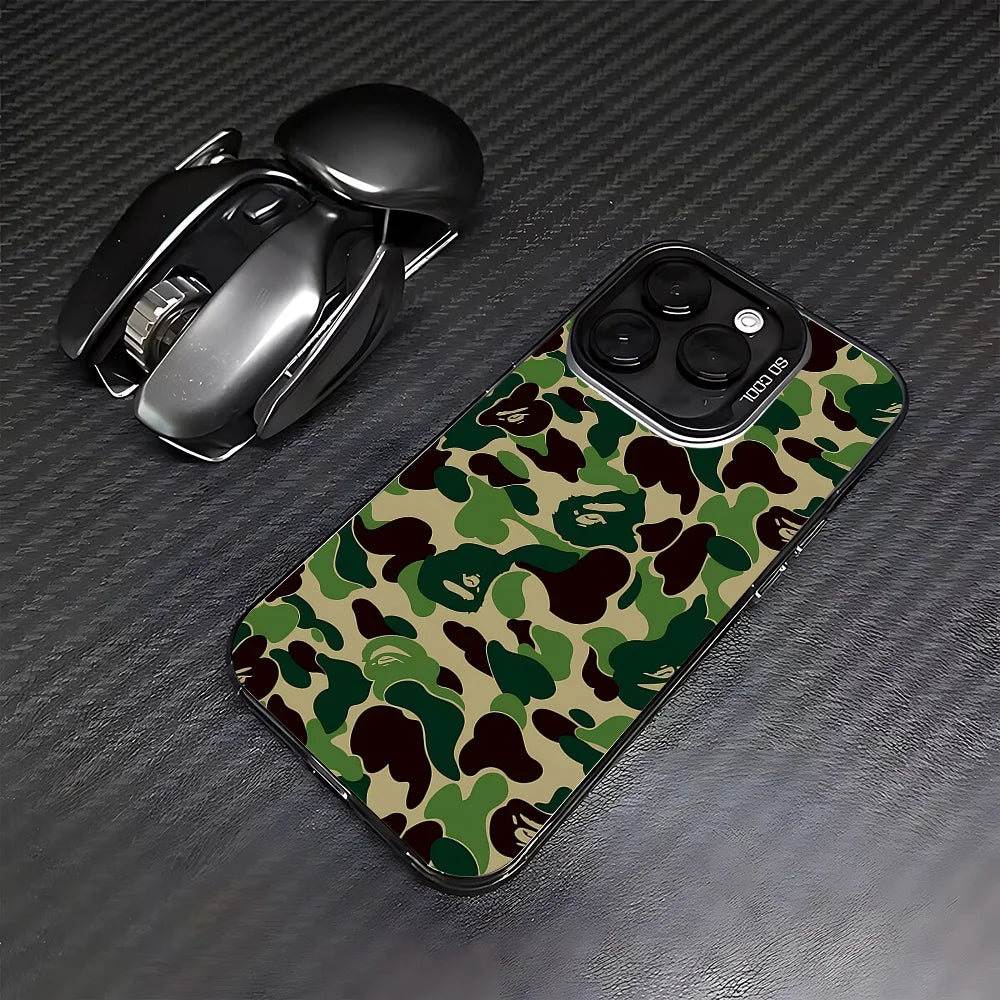A black iPhone is shown with a camouflage patterned case and a matching matte shockproof cover.
