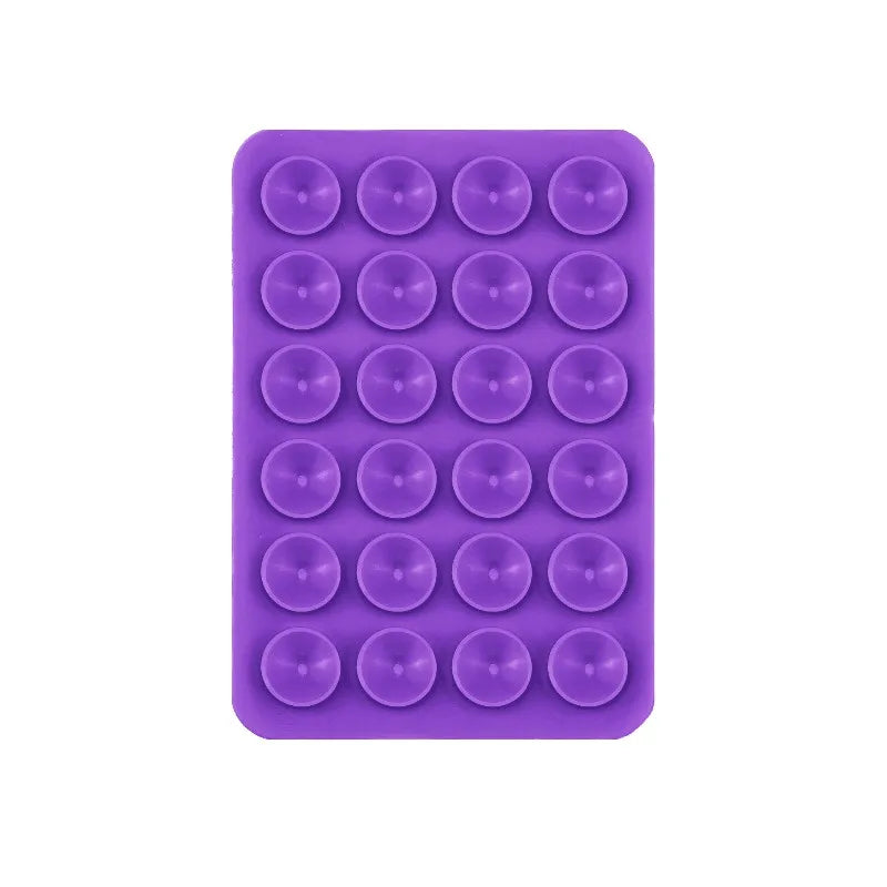 A purple silicone suction cup mount featuring 24 individual cups for phone and tablet mounting.