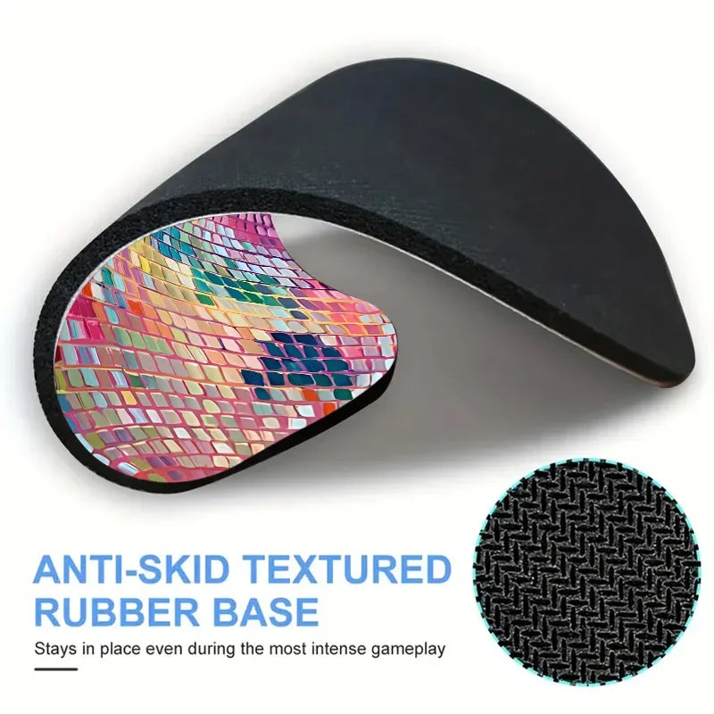 Black anti-skid textured rubber base for a mouse pad with a colorful disco ball design