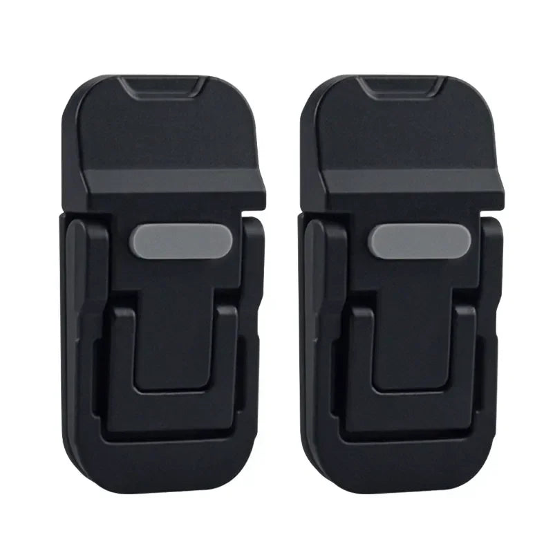 A pair of black portable zinc alloy laptop stand risers.