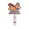 A sparkling badge reel featuring an orange and white fox design with the text I WORK HARD SO MY DOG CAN HAVE A BETTER LIFE