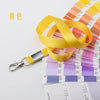 Lanyard amarillo duradero con clip de metal y tiras de paleta de colores para credenciales