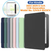 A black silicone protective cover for a 6 inch Kindle e-reader shown next to various colored covers.